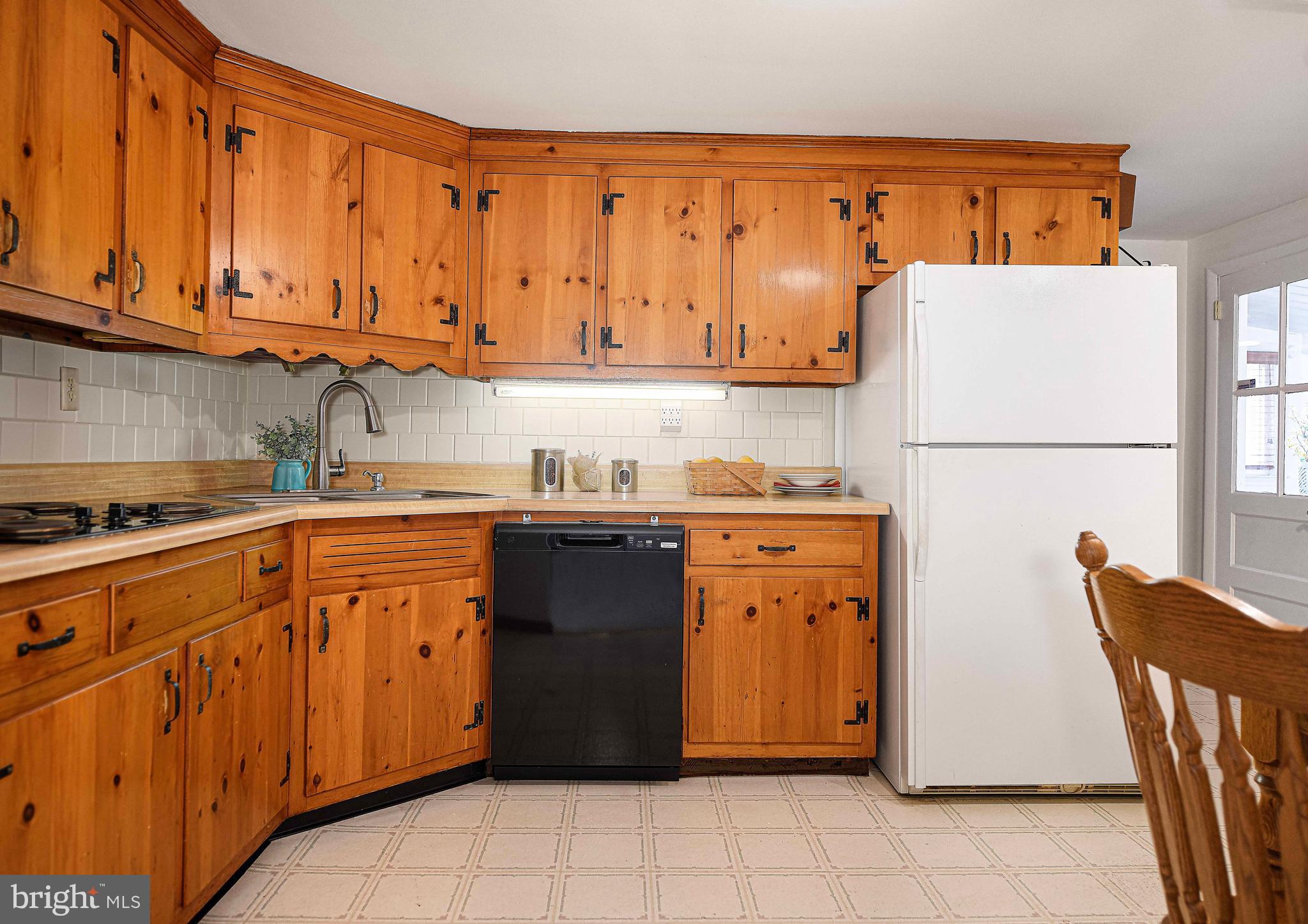 1710 Granite Road Darlington, MD 21034 - Photo 15 of 56 a kitchen with a refrigerator and a stove