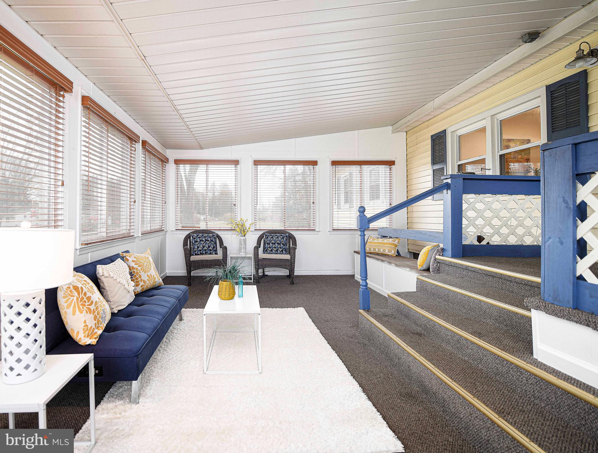 1710 Granite Road Darlington, MD 21034 - Photo 18 of 56 a living room with furniture a rug kitchen view and a large window
