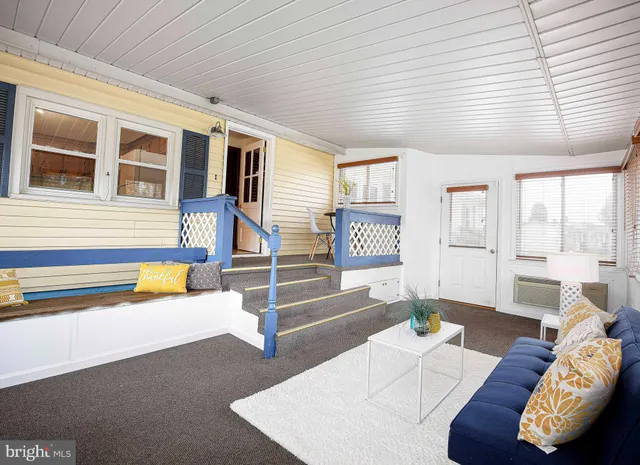 a bed room with a bed and a chandelier