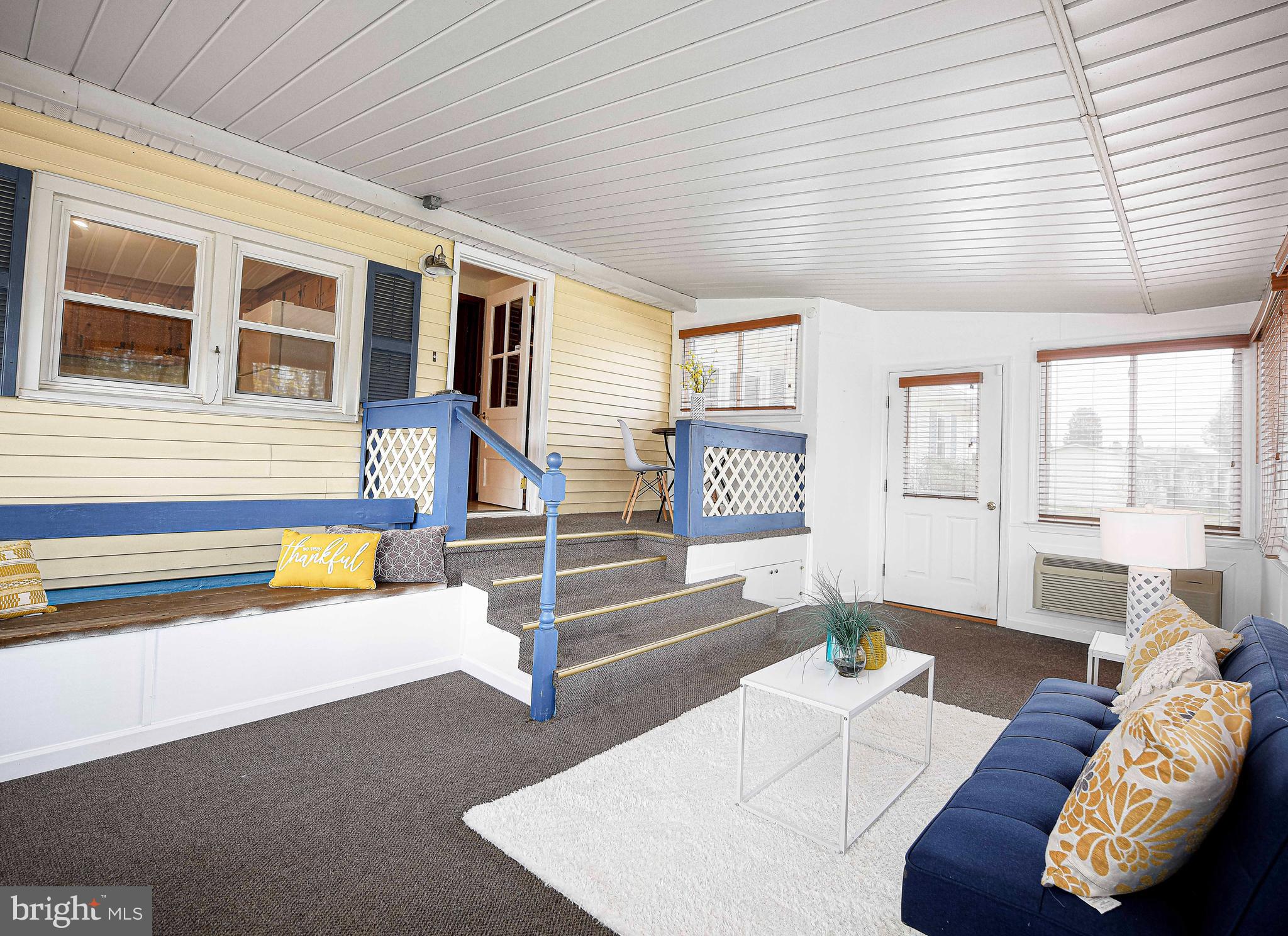1710 Granite Road Darlington, MD 21034 - Photo 21 of 56 a living room with furniture and a floor to ceiling window