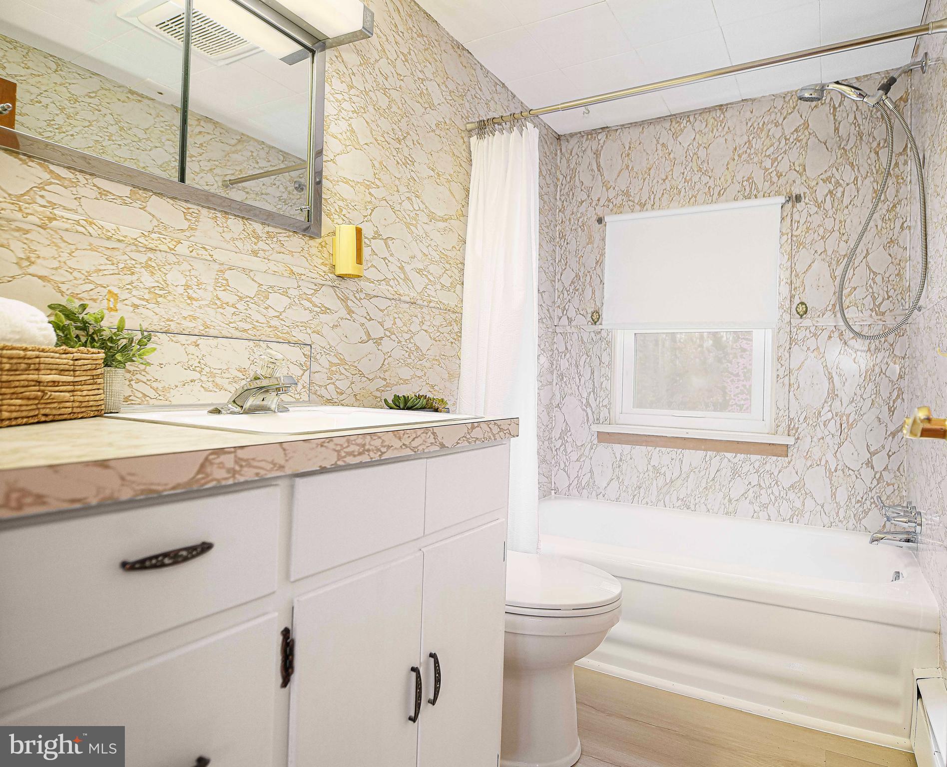 1710 Granite Road Darlington, MD 21034 - Photo 29 of 56 a bathroom with a granite countertop sink a toilet and shower