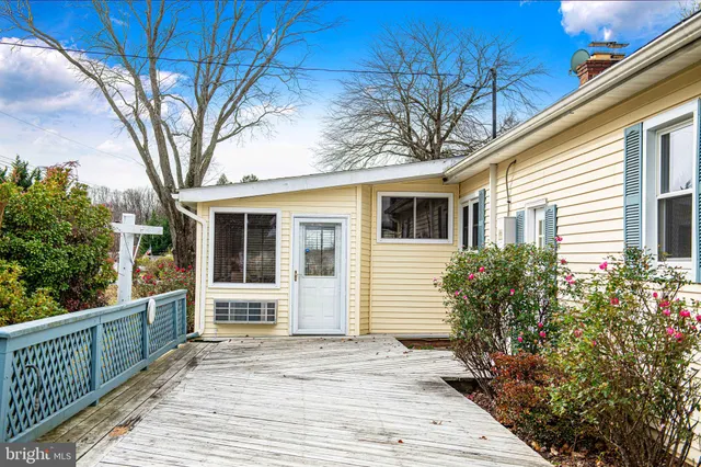 a room with a table and chairs