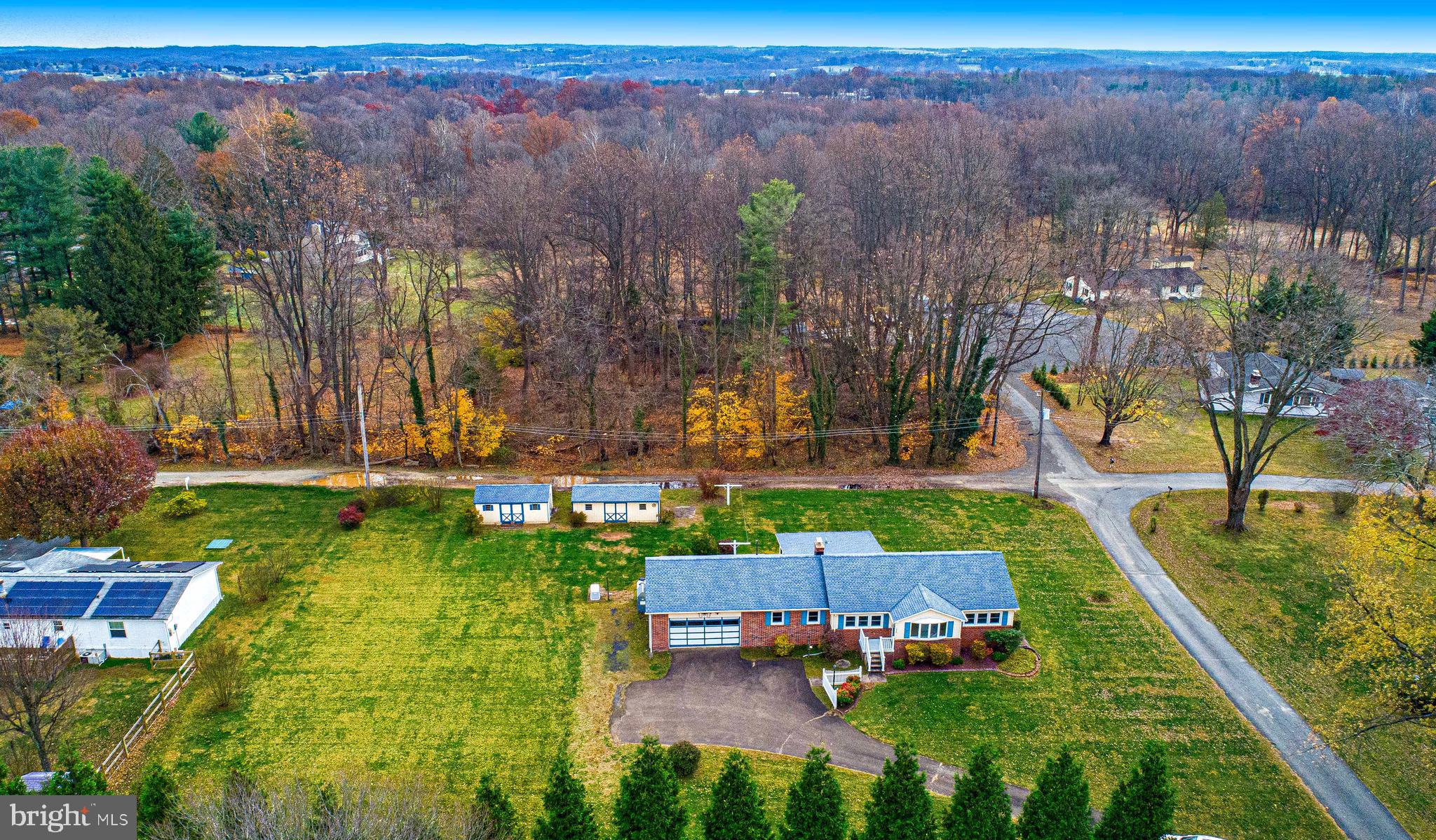 1710 Granite Road Darlington, MD 21034 - Photo 47 of 56 an aerial view of a house with a garden and lake view