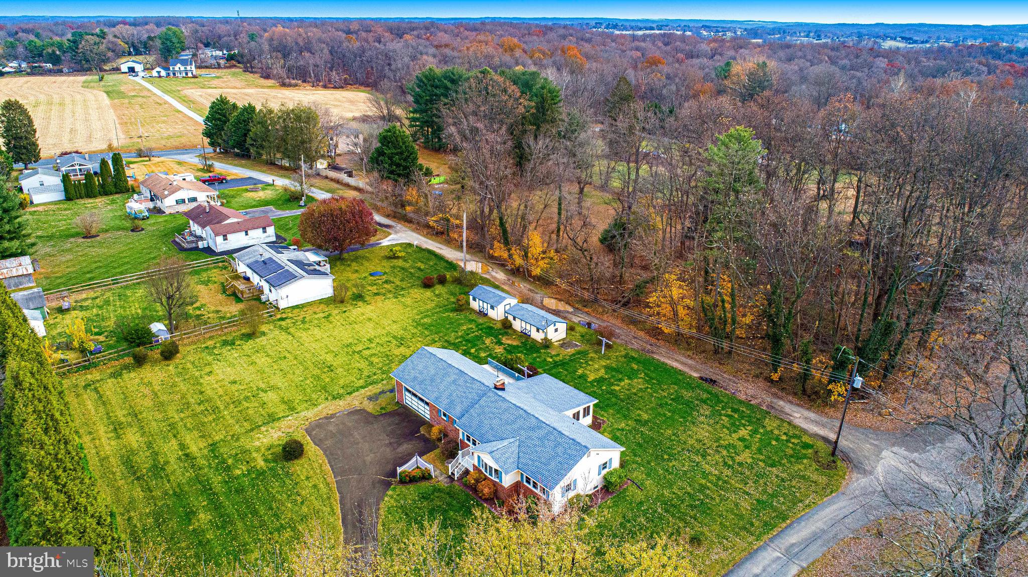 1710 Granite Road Darlington, MD 21034 - Photo 49 of 56 an aerial view of a house with a garden and lake view