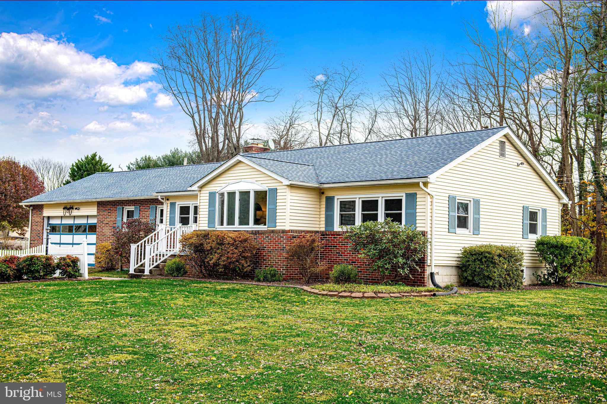 1710 Granite Road Darlington, MD 21034 - Photo 6 of 56 a front view of a house with a garden