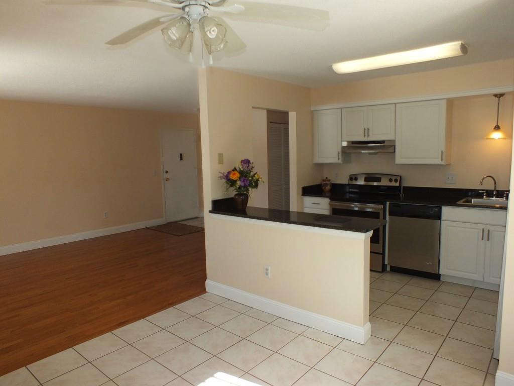 93 Kent Court, Unit 93 Meriden, CT 06450 - Photo 6 of 27 a kitchen with a sink and cabinets