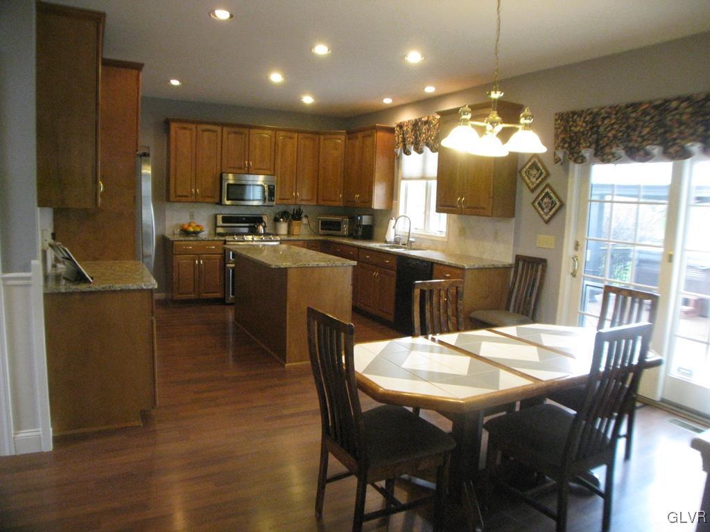 5912 Ricky Ridge Trail Orefield, PA 18069 - Photo 11 of 42 Kitchen and breakfast area with access to the outd