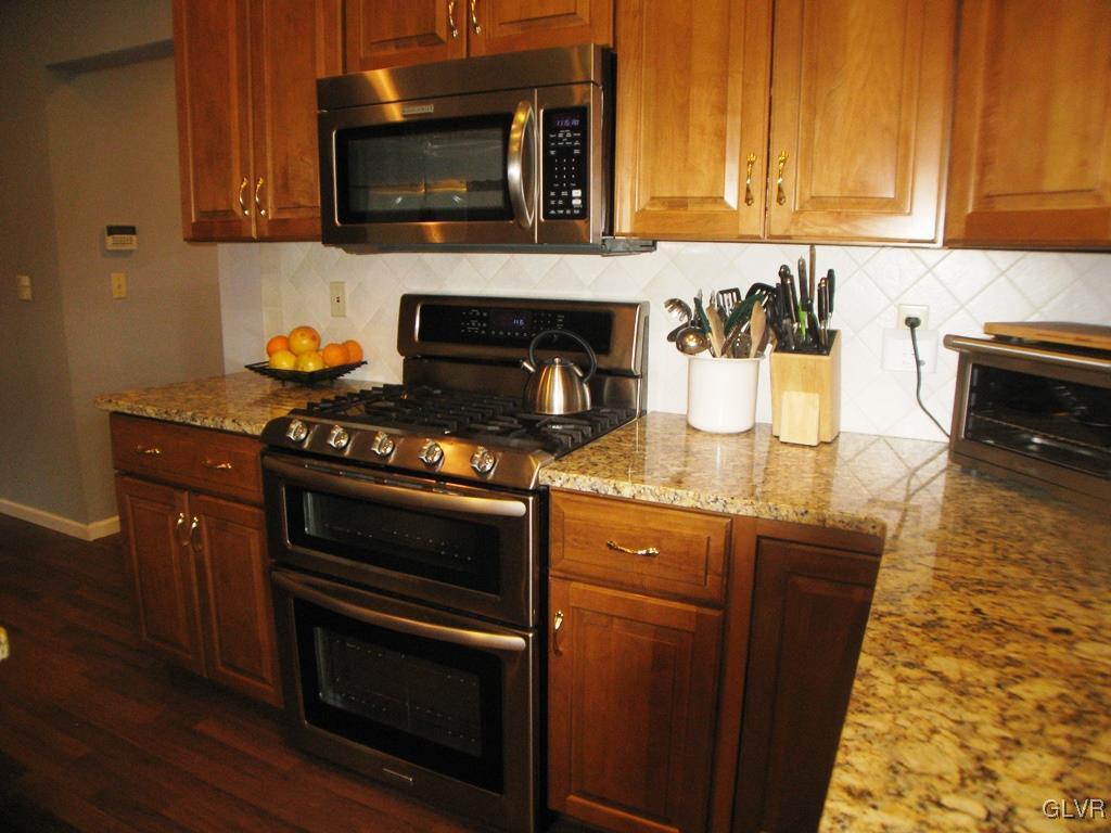 5912 Ricky Ridge Trail Orefield, PA 18069 - Photo 15 of 42 Gas range with two ovens and microwave