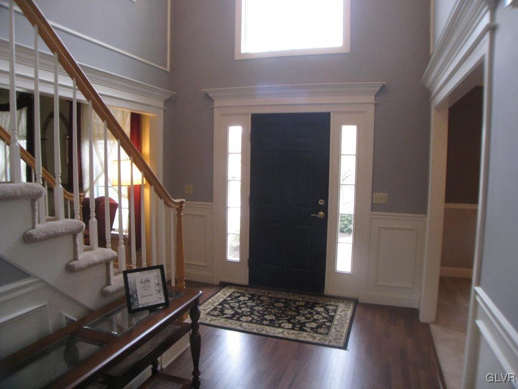 5912 Ricky Ridge Trail Orefield, PA 18069 - Photo 4 of 42 Foyer with chair rail and picture frame moldings
