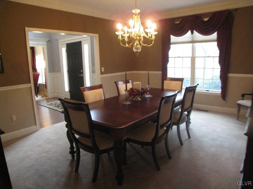 5912 Ricky Ridge Trail Orefield, PA 18069 - Photo 7 of 42 Entertaining size dining room with crown molding a