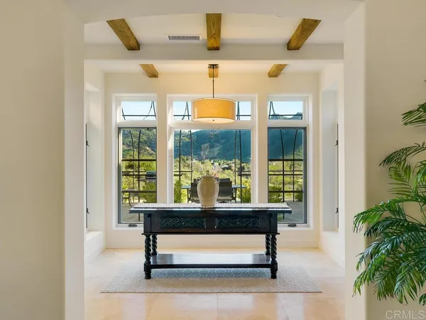 a stove top oven sitting inside of a kitchen
