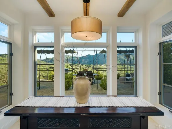 a kitchen with stainless steel appliances granite countertop a sink a stove top oven a counter space and cabinets