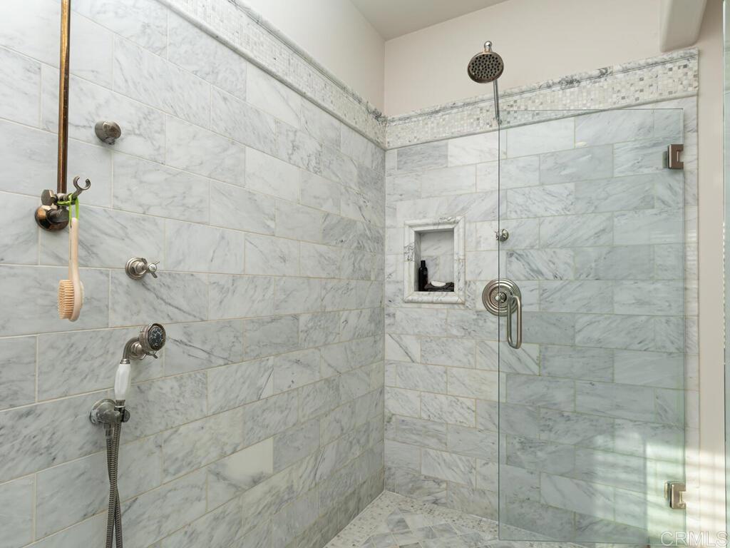 31267 Rancho Amigos Road Bonsall, CA 92003 - Photo 25 of 74 a bathroom with a shower