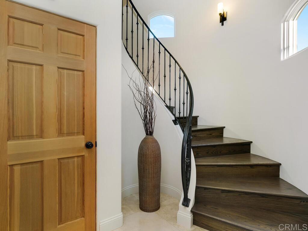 31267 Rancho Amigos Road Bonsall, CA 92003 - Photo 33 of 74 a view of entryway and hall with wooden floor