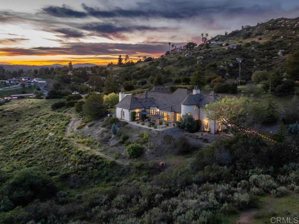 31267 Rancho Amigos Road Bonsall, CA 92003 - Photo 68 of 74 a view of a city with green field