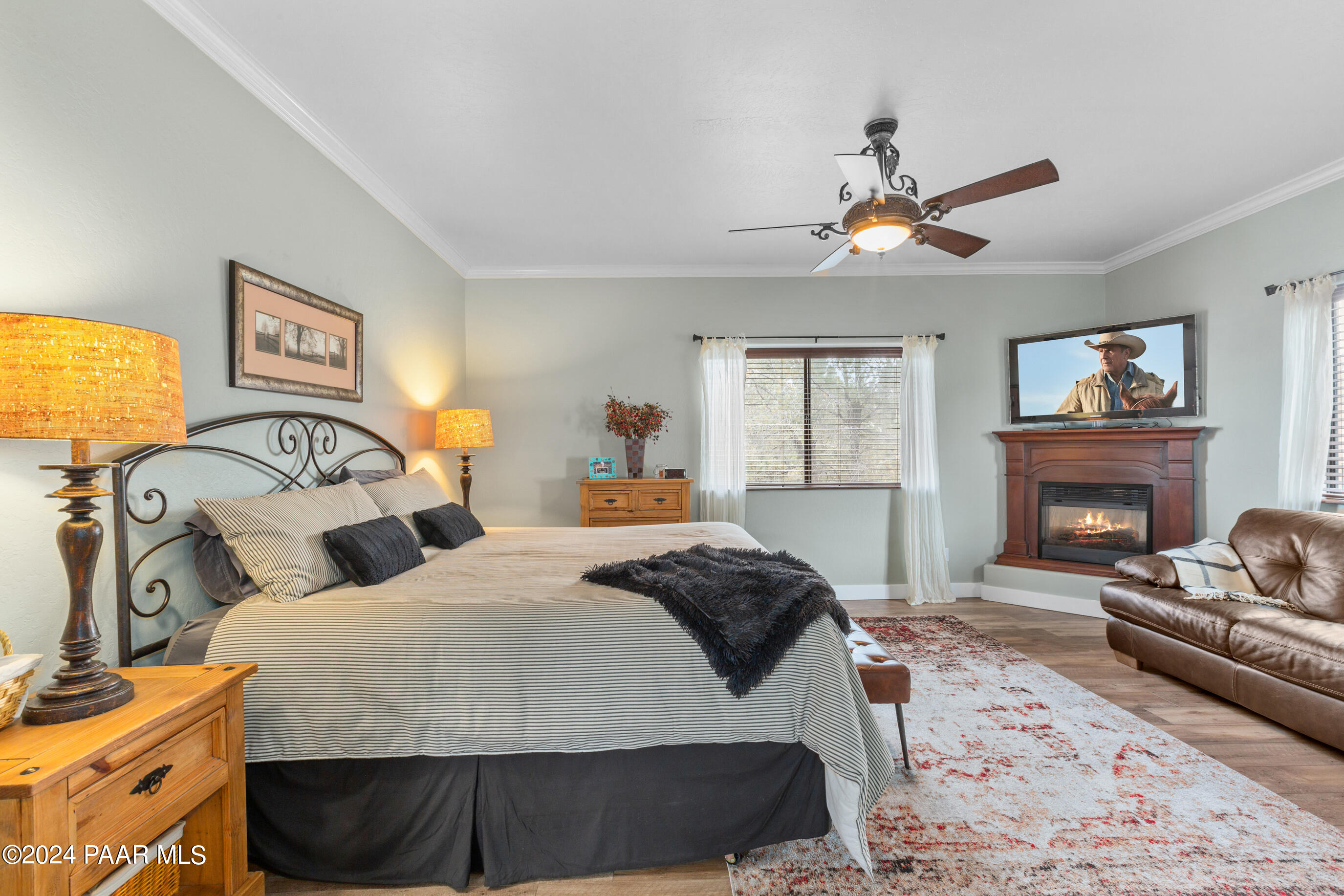 1561 Eagle Ridge Road Prescott, AZ 86301 - Photo 13 of 46 Primary bedroom with fireplace