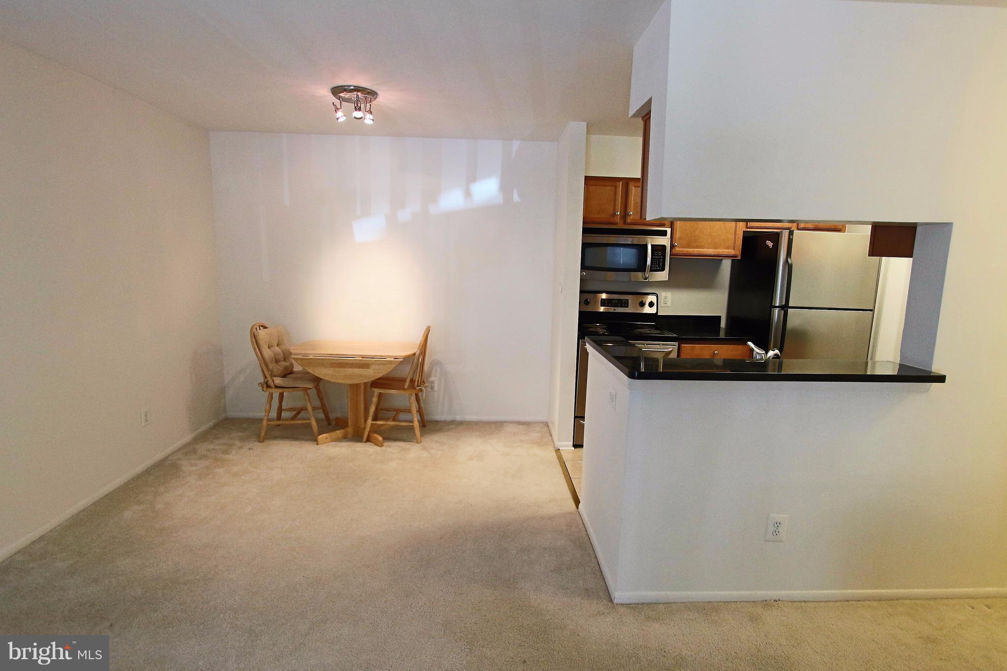 1703 Ascot Way, Unit E Reston, VA 20190 - Photo 14 of 24 Dining Room