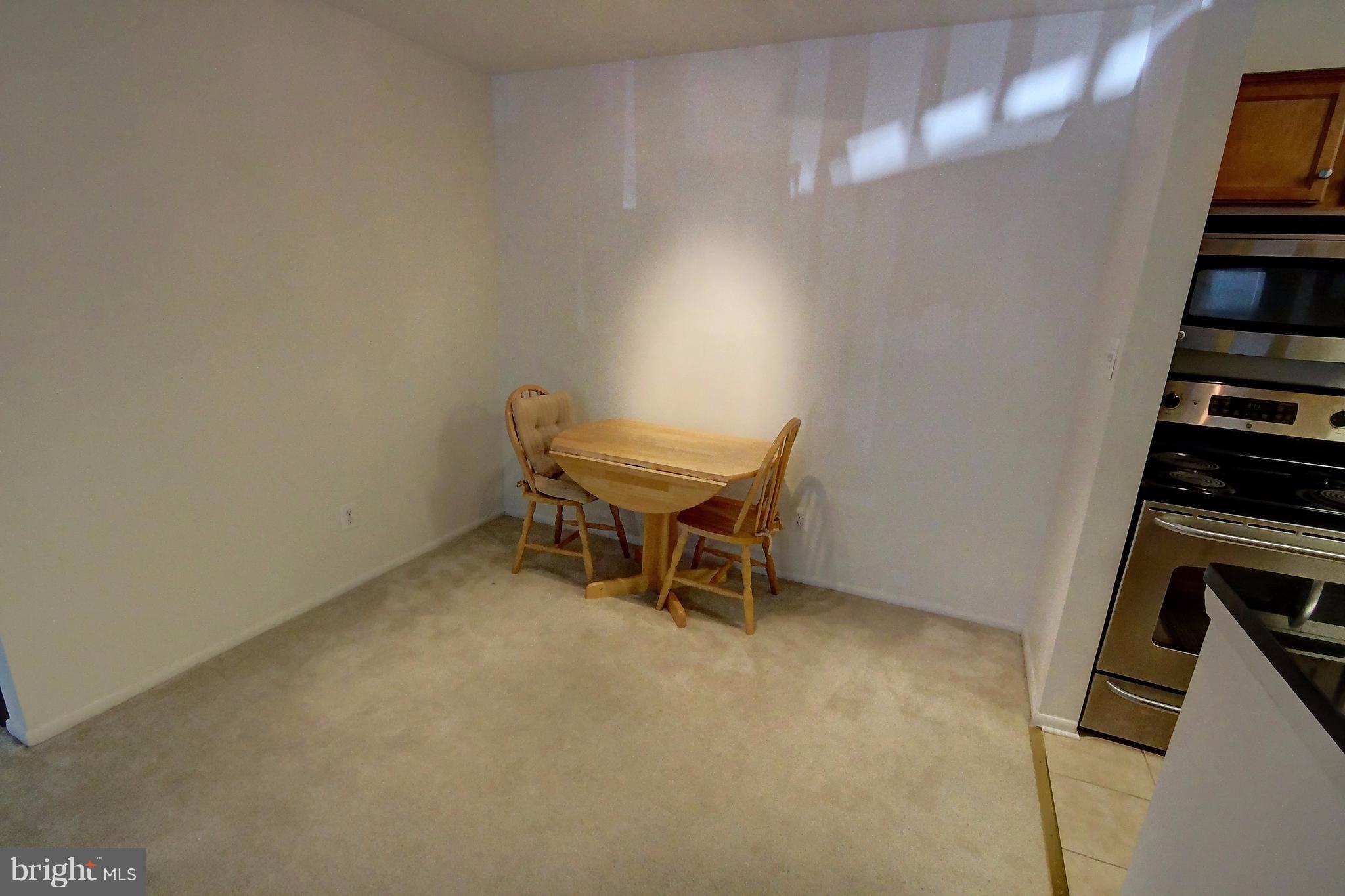 1703 Ascot Way, Unit E Reston, VA 20190 - Photo 15 of 24 Dining Room