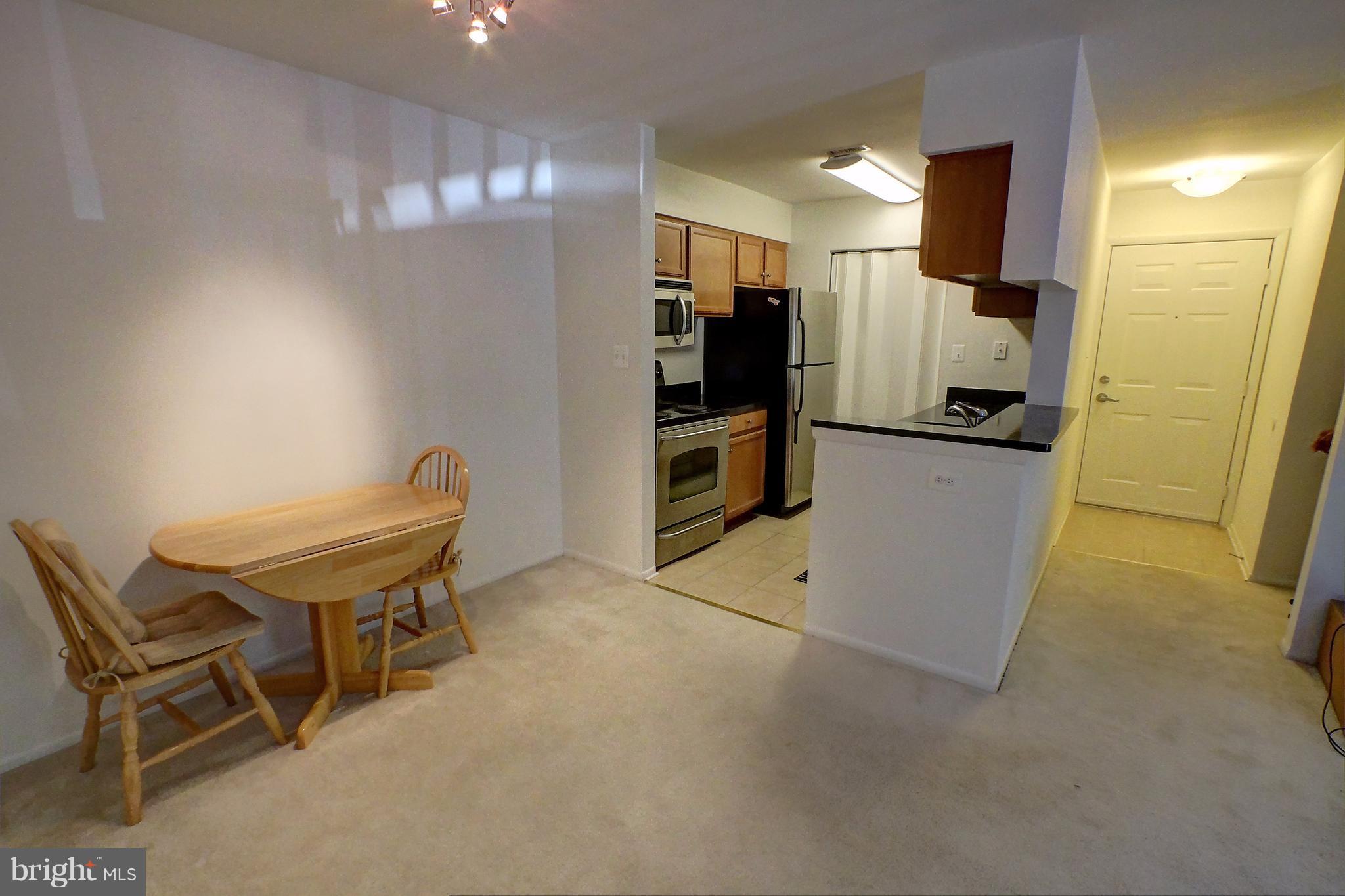 1703 Ascot Way, Unit E Reston, VA 20190 - Photo 8 of 24 Dining Room/Kitchen