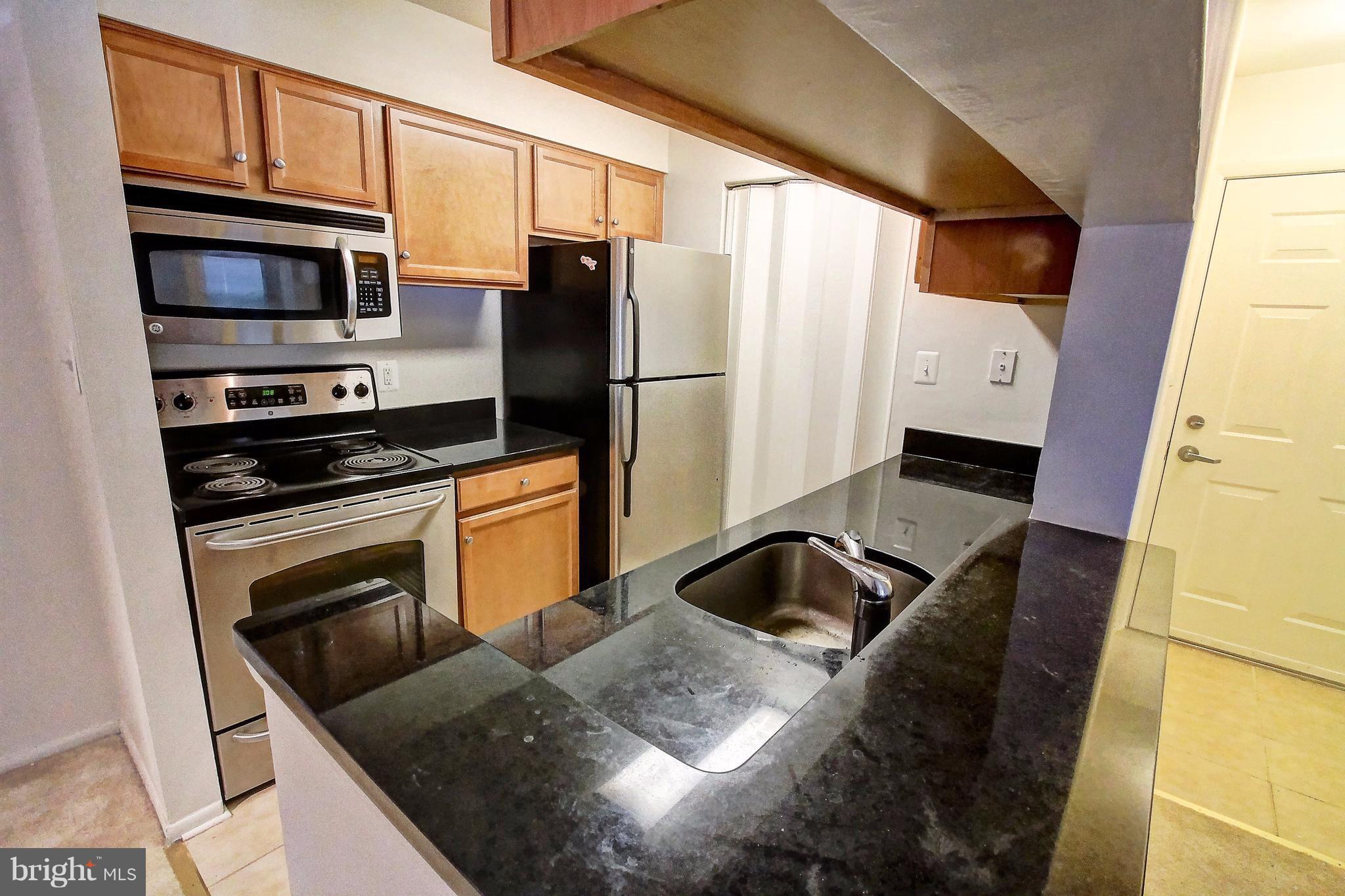 1703 Ascot Way, Unit E Reston, VA 20190 - Photo 9 of 24 Kitchen