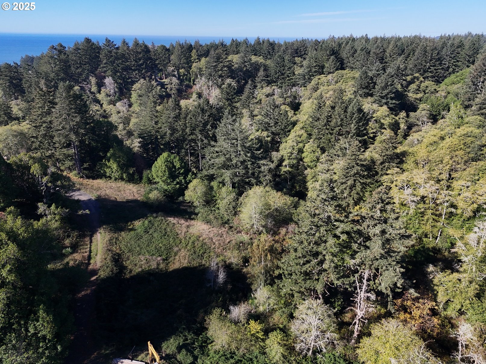 Brooke Lane, Unit 4 Brookings, OR 97415 - Photo 13 of 19 an aerial view of a house with a yard