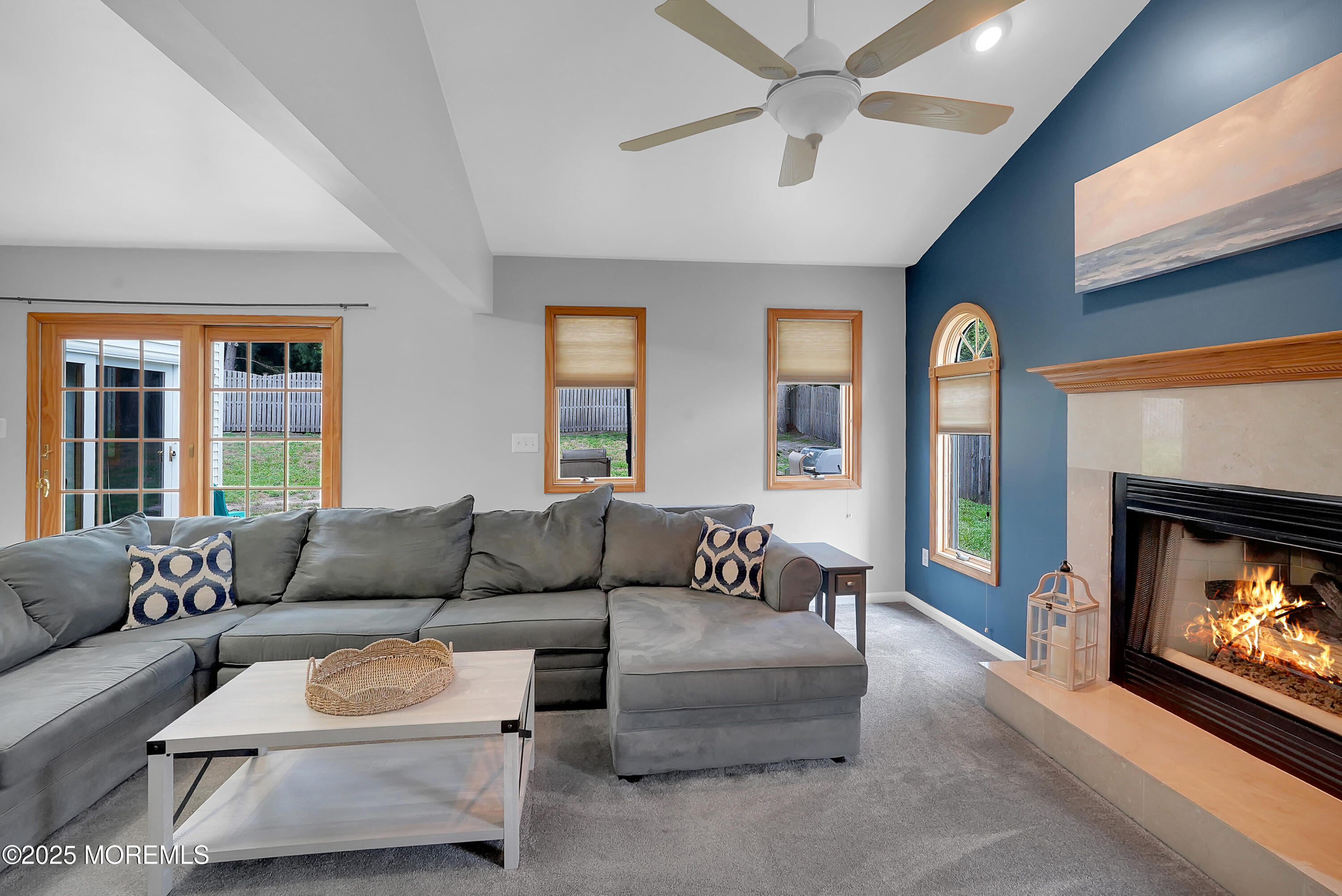 12 Quailtree Lane Howell, NJ 07731 - Photo 17 of 51 a living room with furniture and a fireplace