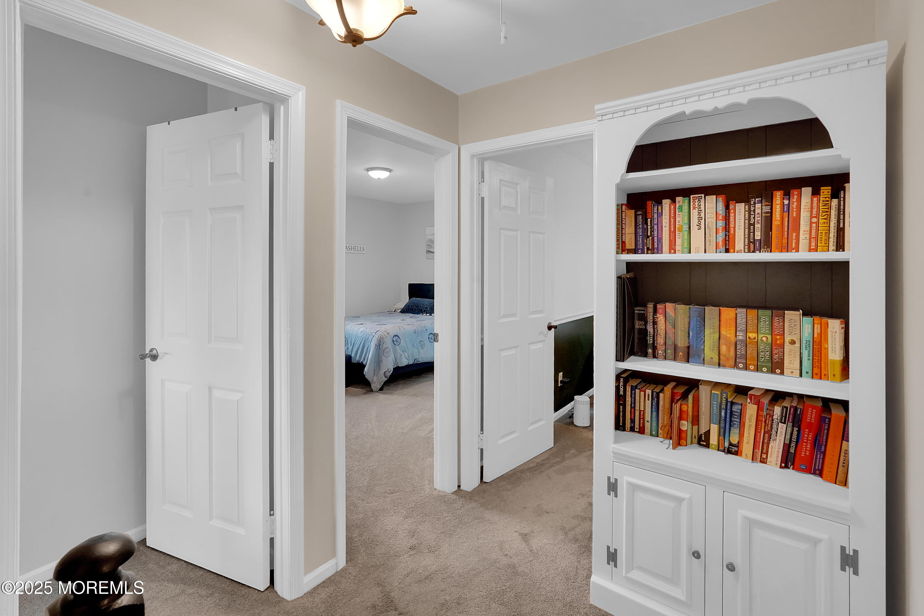 12 Quailtree Lane Howell, NJ 07731 - Photo 30 of 51 a view of a livingroom with a bookshelf