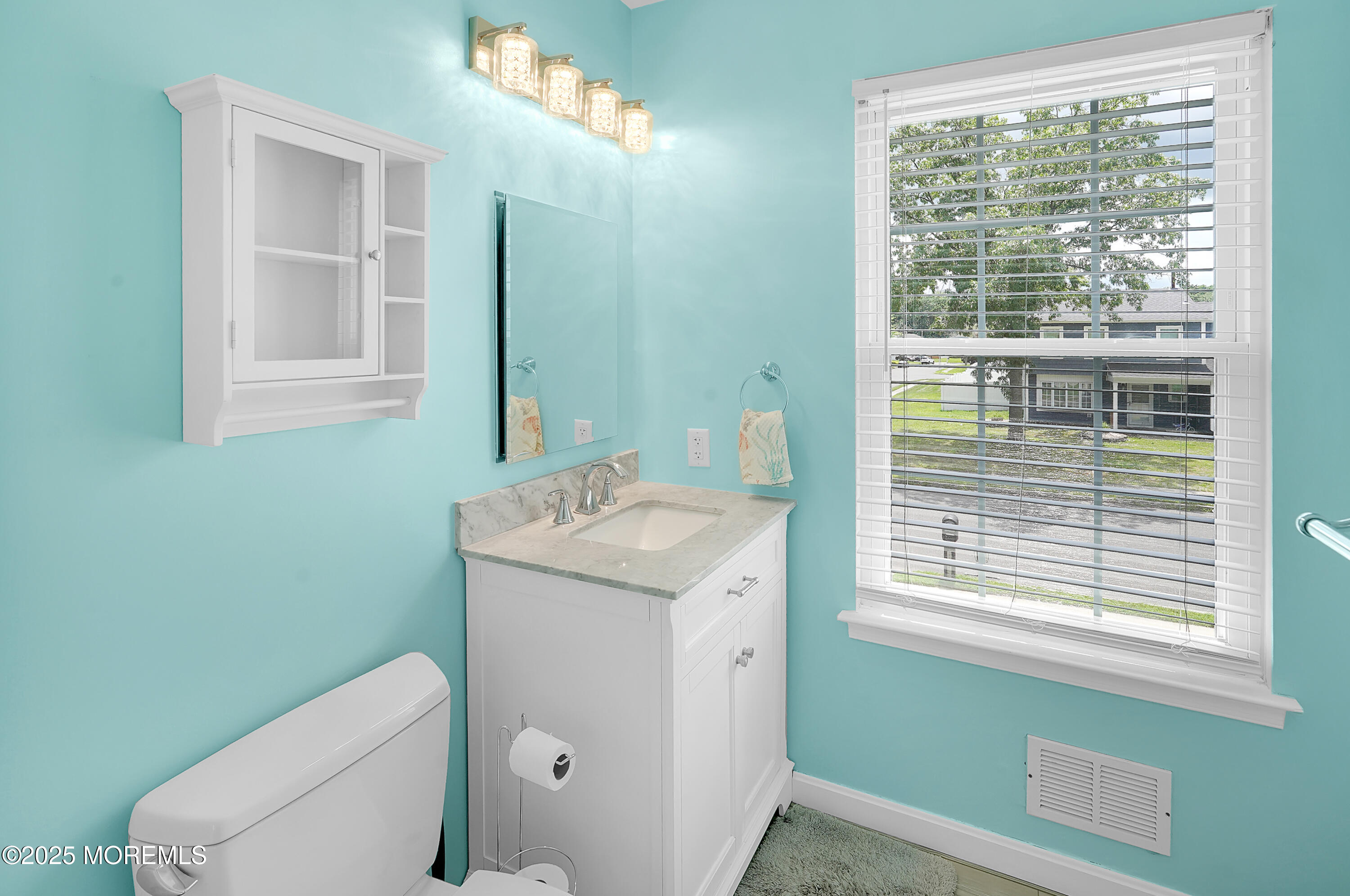 12 Quailtree Lane Howell, NJ 07731 - Photo 35 of 51 a bathroom with a toilet sink and window