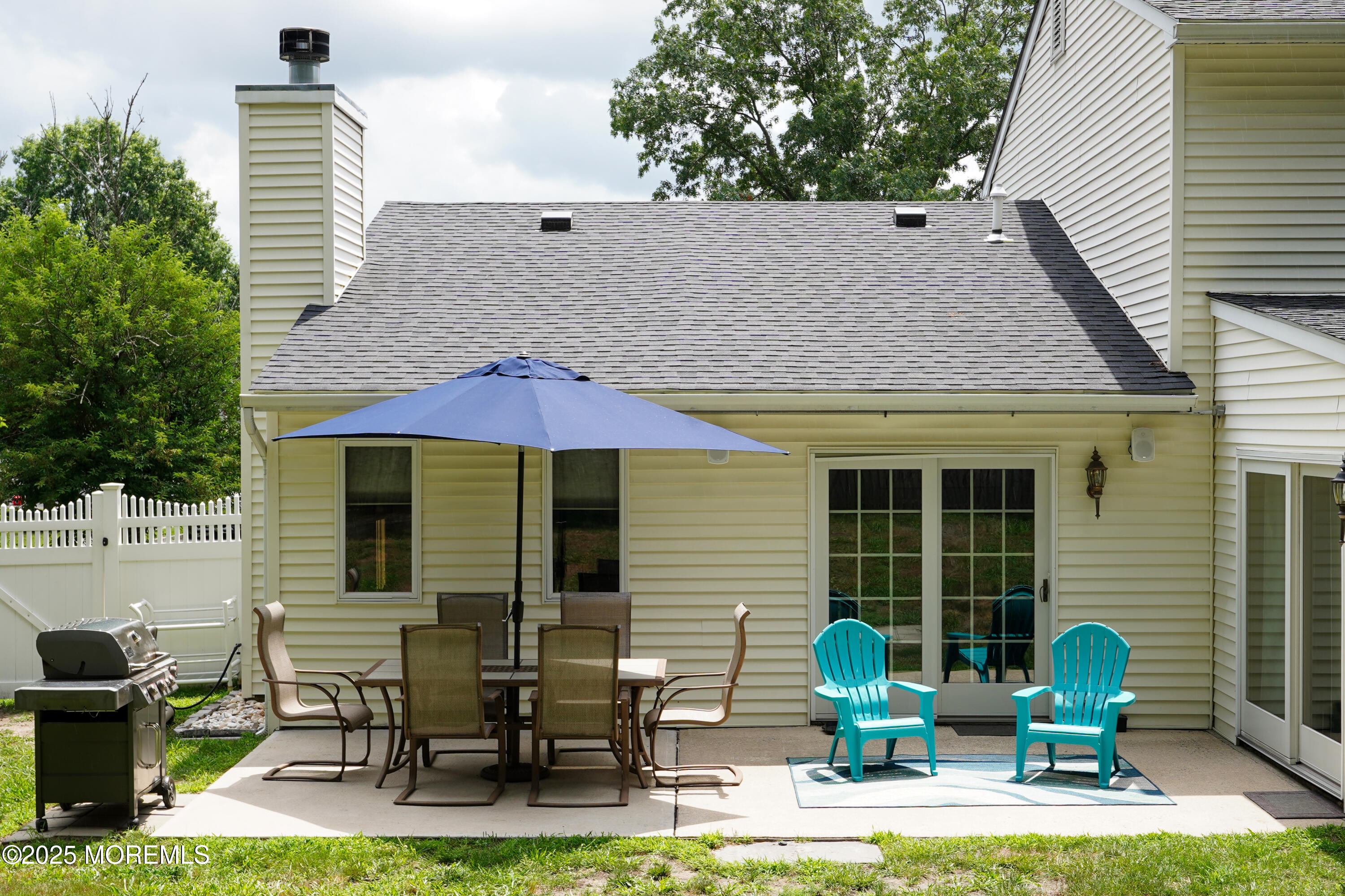 12 Quailtree Lane Howell, NJ 07731 - Photo 43 of 51 a backyard of a house with outdoor seating