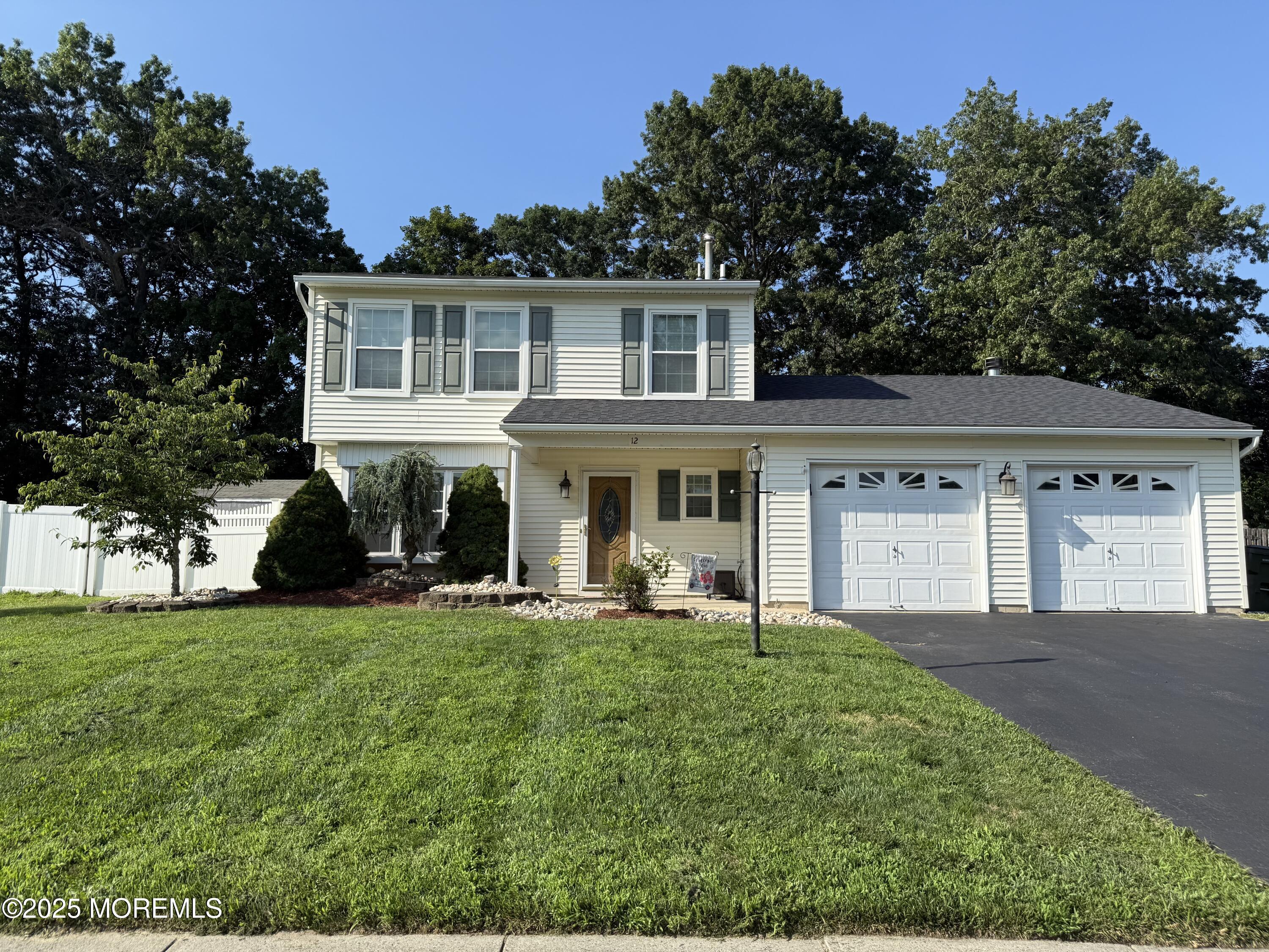 12 Quailtree Lane Howell, NJ 07731 - Photo 51 of 51 a front view of a house with a yard