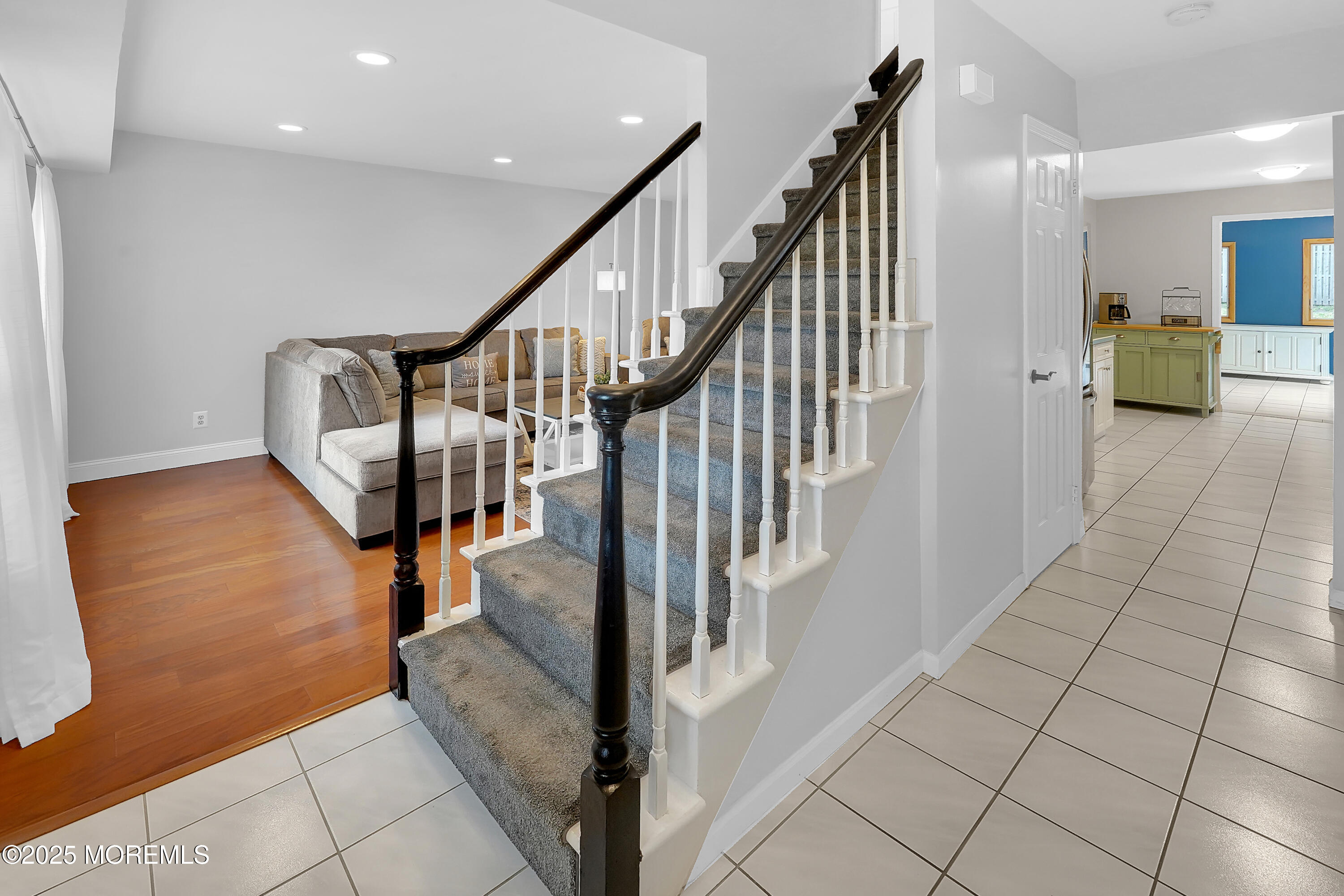 12 Quailtree Lane Howell, NJ 07731 - Photo 6 of 51 a view of staircase with white walls and railing