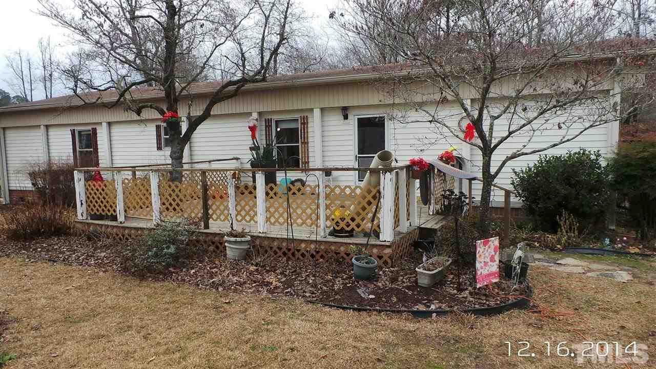 696 Lamms Grove Road Carthage, NC 28327 - Photo 1 of 9 a view of a small house in the front of a house
