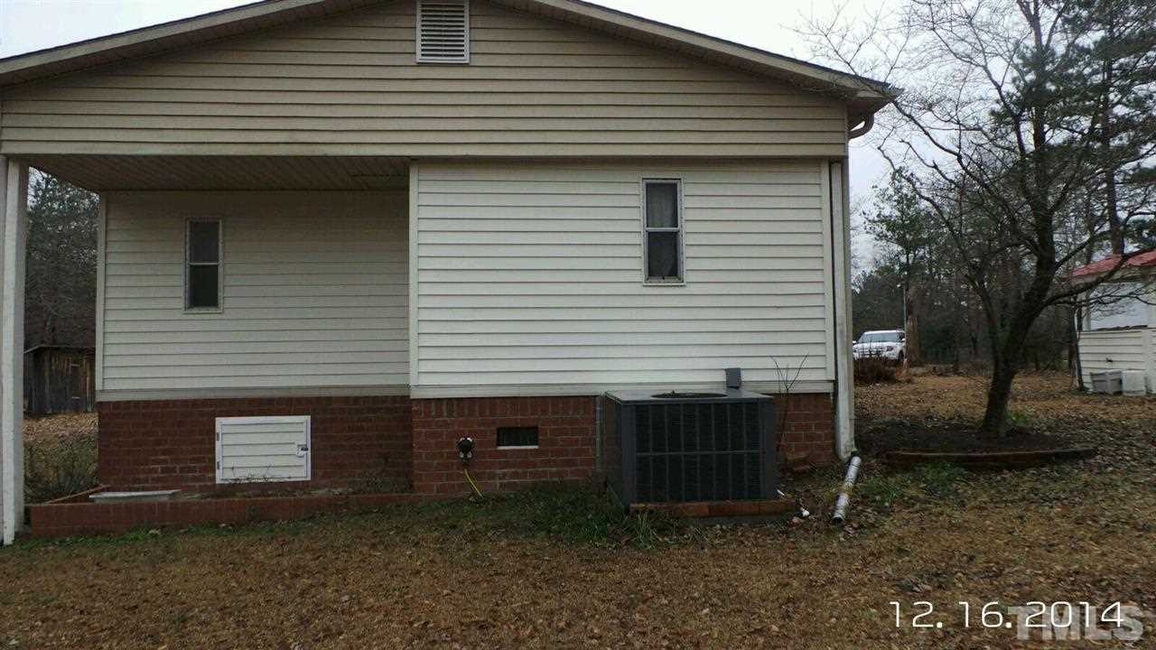 696 Lamms Grove Road Carthage, NC 28327 - Photo 6 of 9 a front view of a house with garden