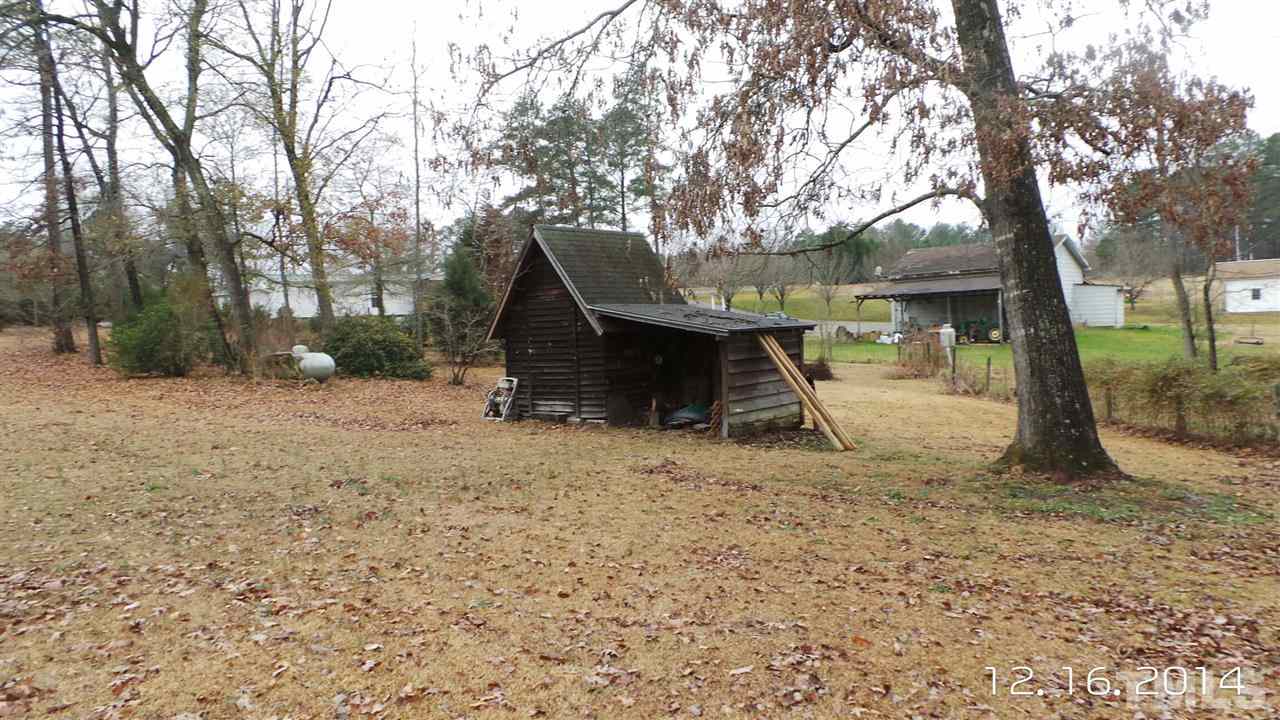 696 Lamms Grove Road Carthage, NC 28327 - Photo 7 of 9 a view of a house with a backyard