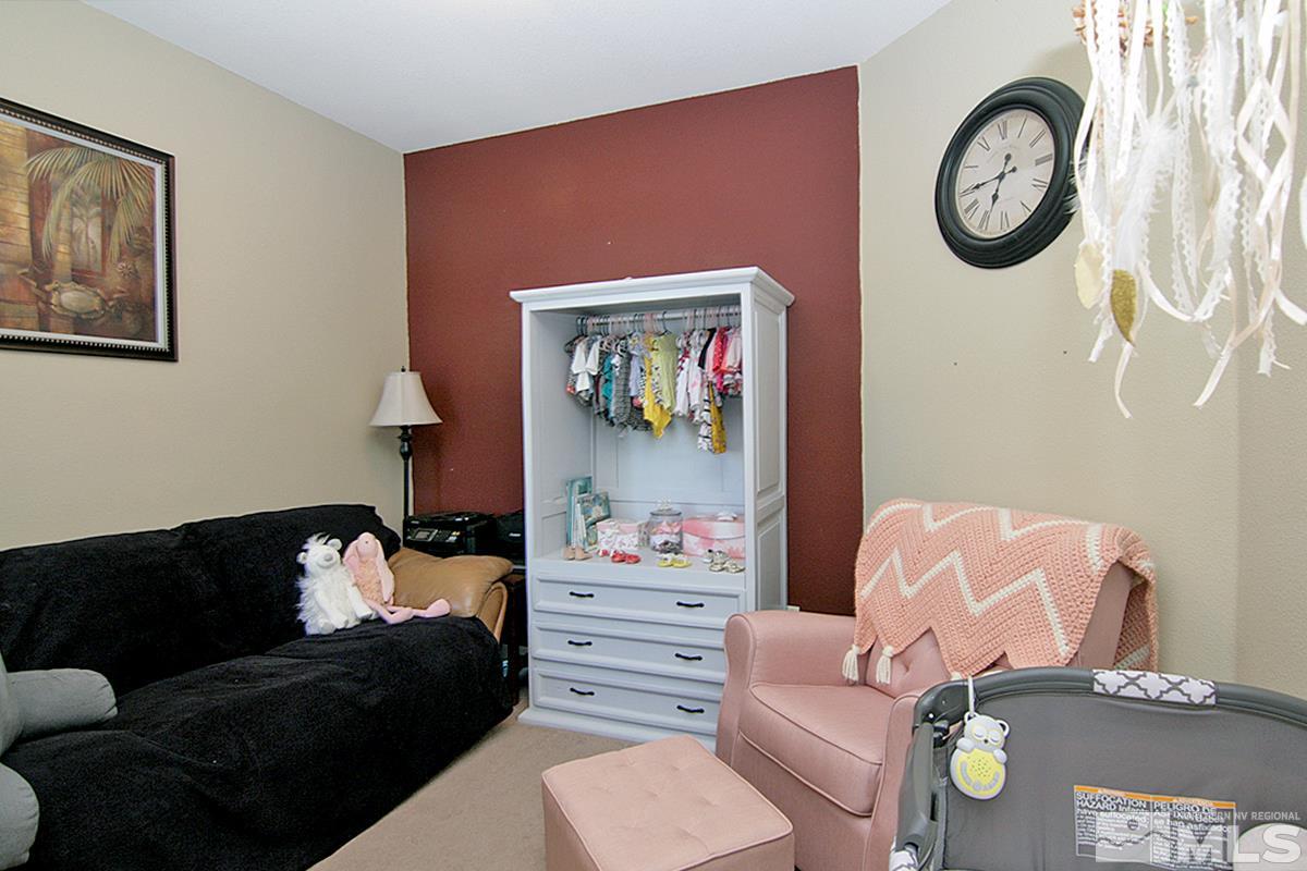 11032 Colton Drive Reno, NV 89521 - Photo 13 of 24 a living room with furniture and a lamp