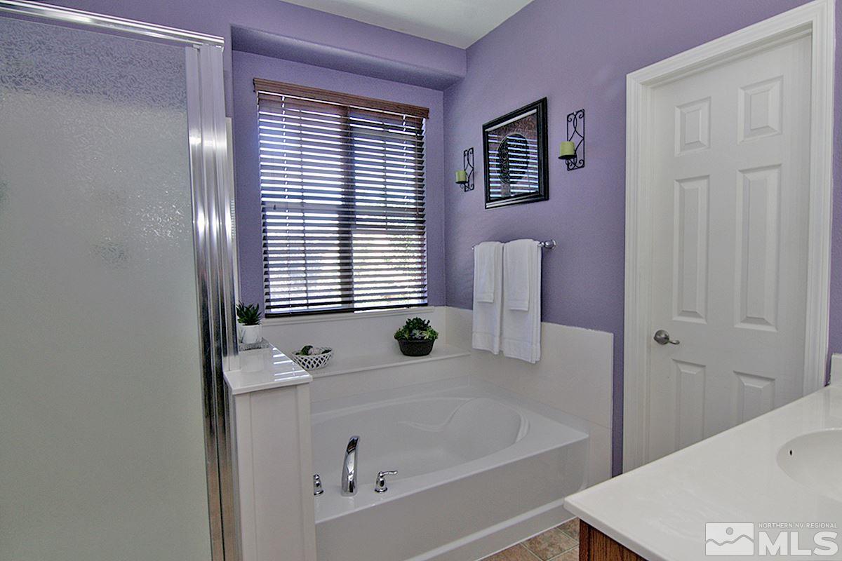 11032 Colton Drive Reno, NV 89521 - Photo 14 of 24 a bathroom with a bathtub