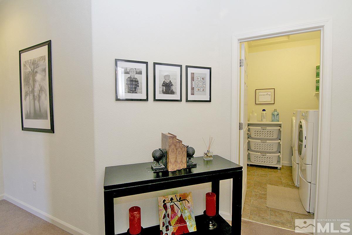 11032 Colton Drive Reno, NV 89521 - Photo 16 of 24 a room with storage and a painting on the wall