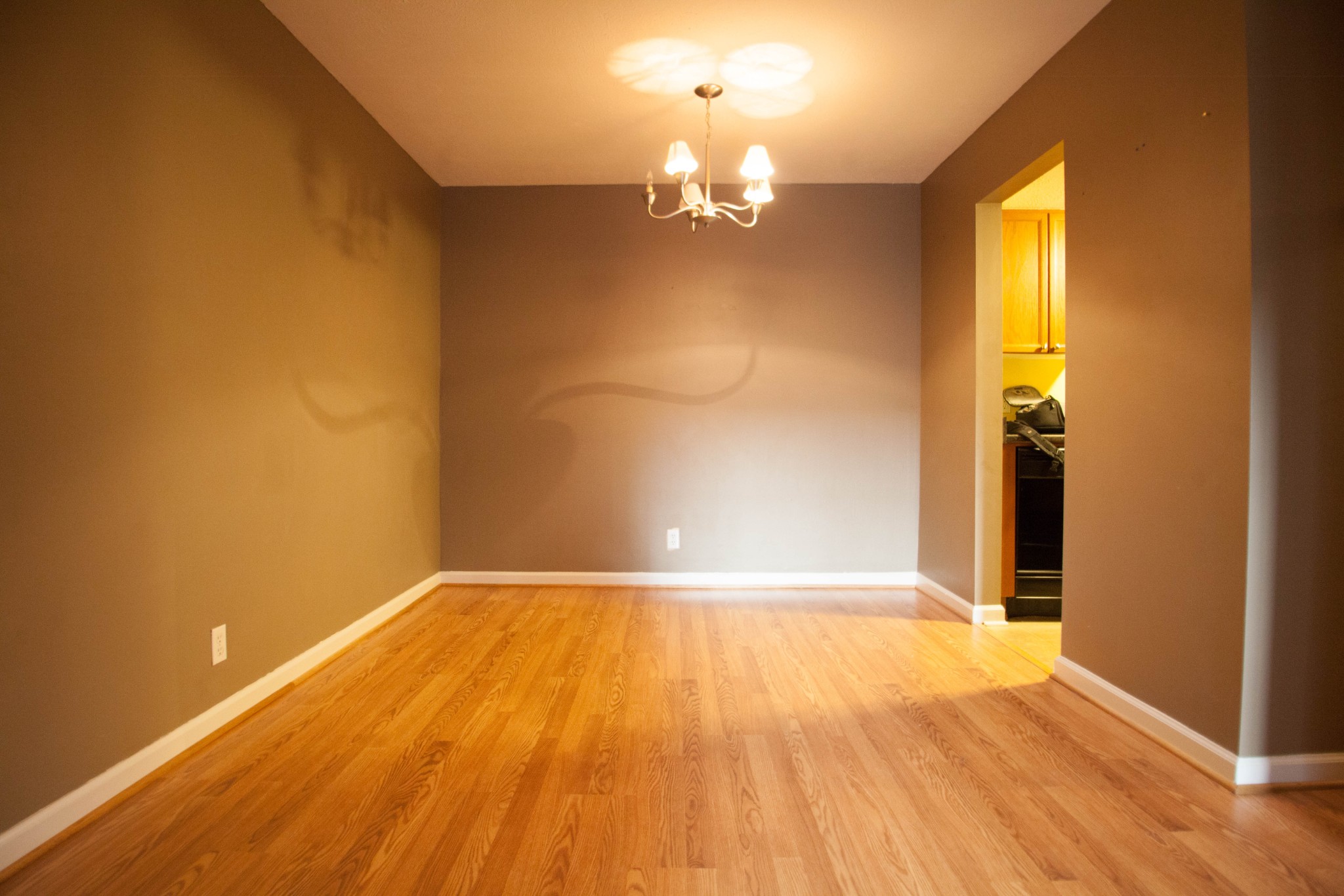 420 Elysian Fields Road, Unit E10 Nashville, TN 37211 - Photo 3 of 10 a view of empty room with wooden floor and fan