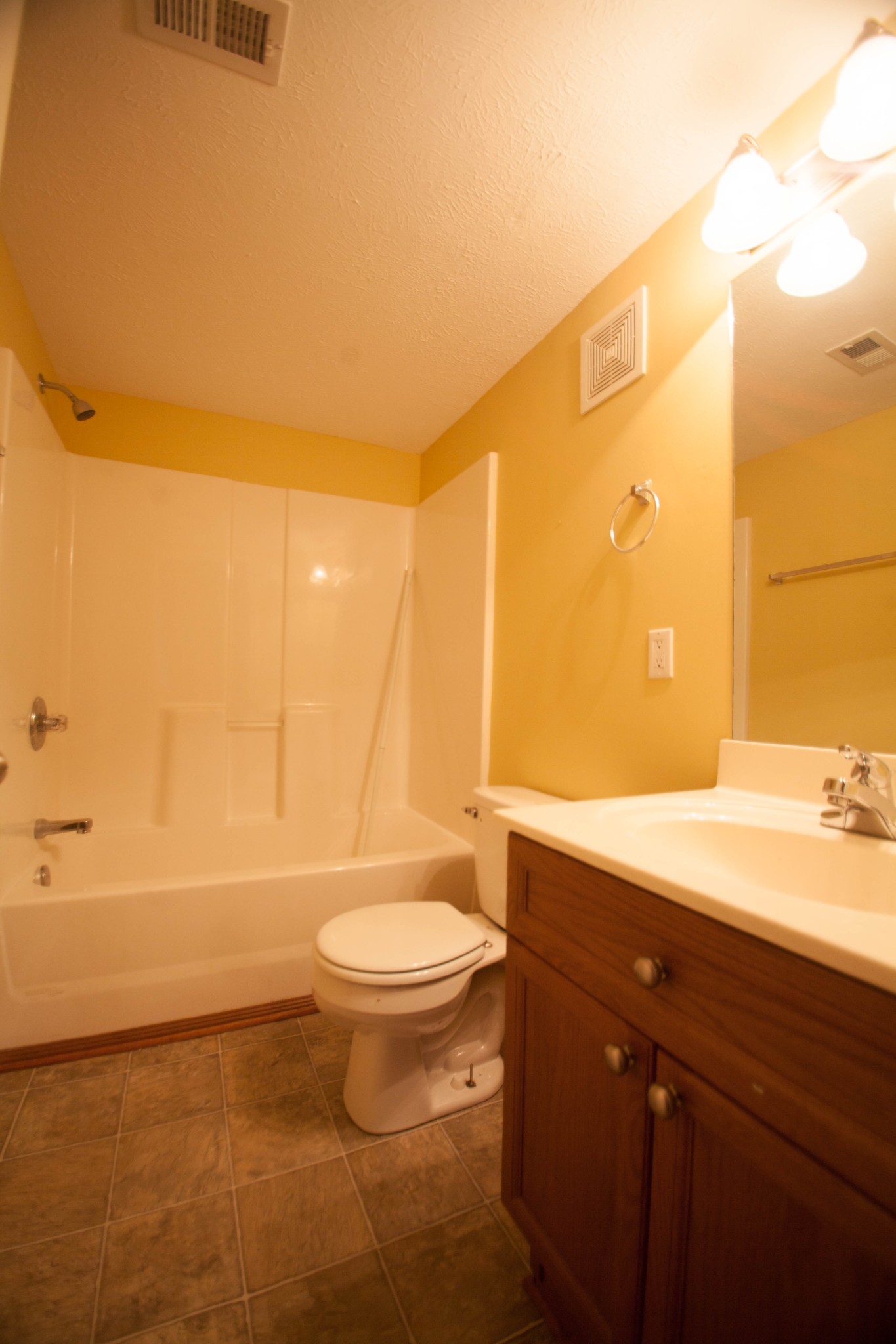 420 Elysian Fields Road, Unit E10 Nashville, TN 37211 - Photo 4 of 10 a bathroom with a sink a toilet and shower
