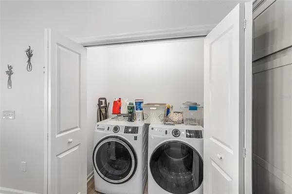 a utility room with dryer and washer