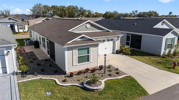 a aerial view of a house with garden