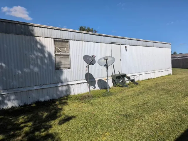 a view of a wooden fence