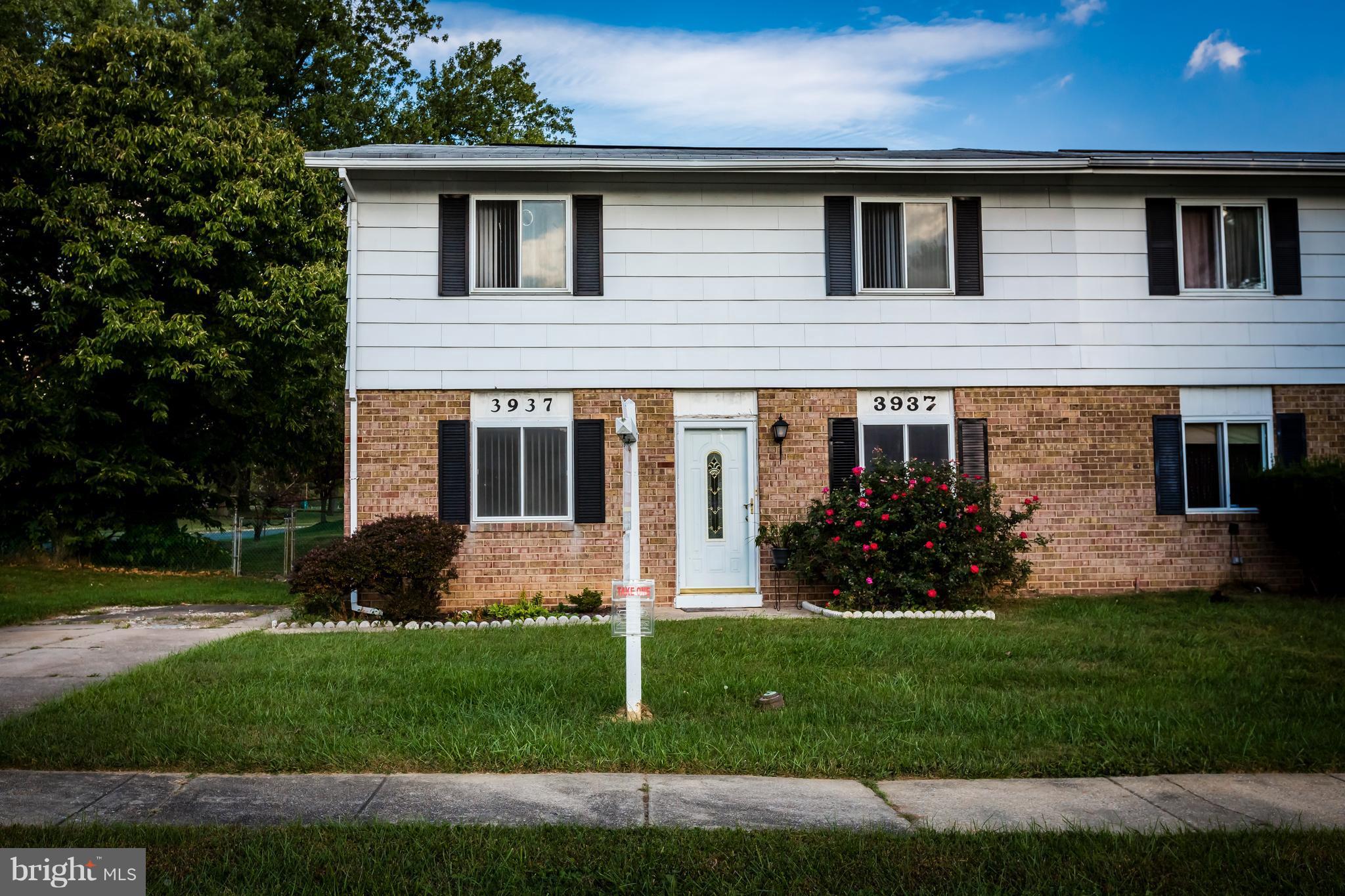 3937 Setonhurst Road Baltimore, MD 21208 - Photo 1 of 29 a front view of house with yard and green space