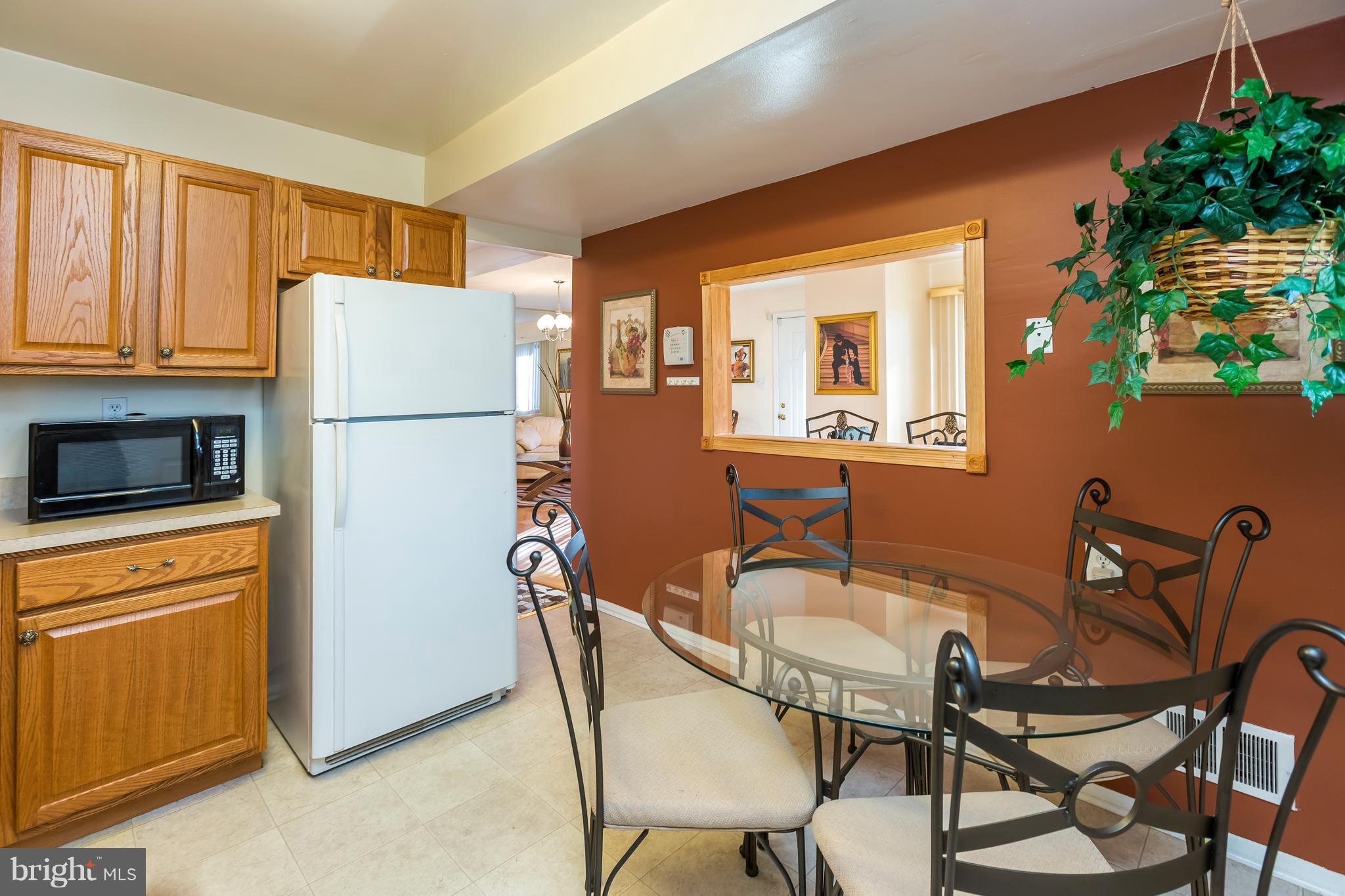 3937 Setonhurst Road Baltimore, MD 21208 - Photo 14 of 29 a dining room with furniture and window