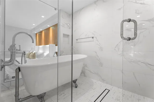 a bathroom with a sink and mirror