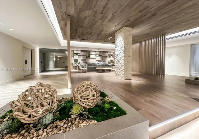 a view of a livingroom with furniture