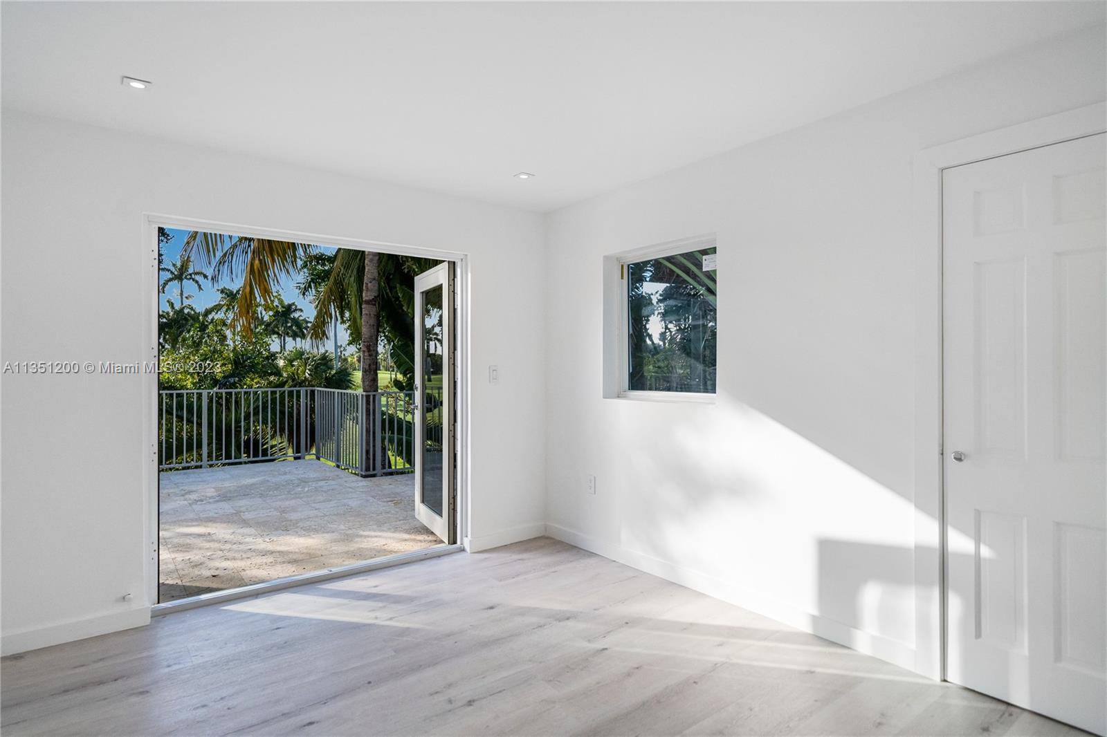 5512 La Gorce Drive Miami Beach, FL 33140 - Photo 27 of 35 a view of entryway with wooden floor