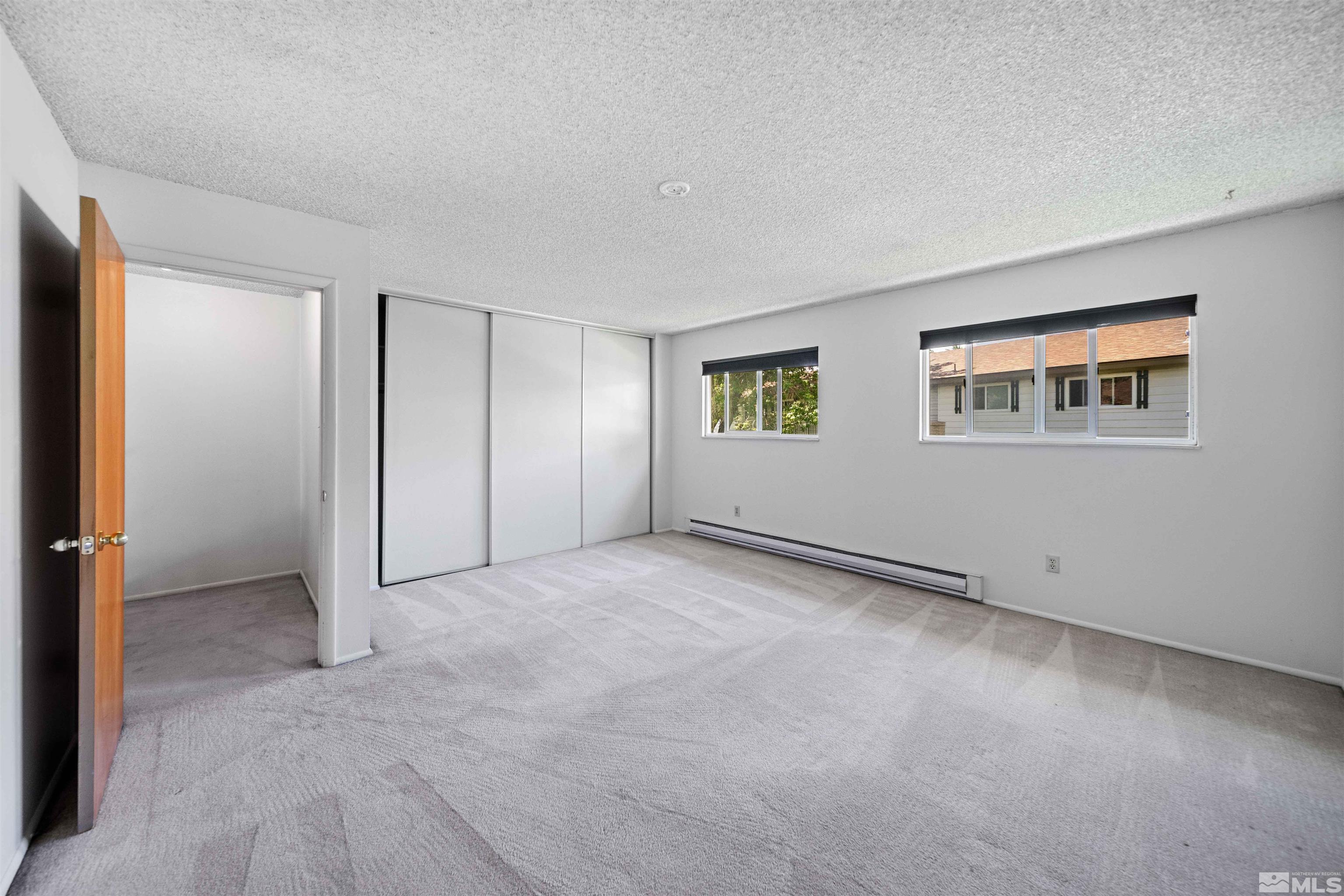 426 Smithridge Drive Reno, NV 89502 - Photo 13 of 20 a view of an empty room with a window