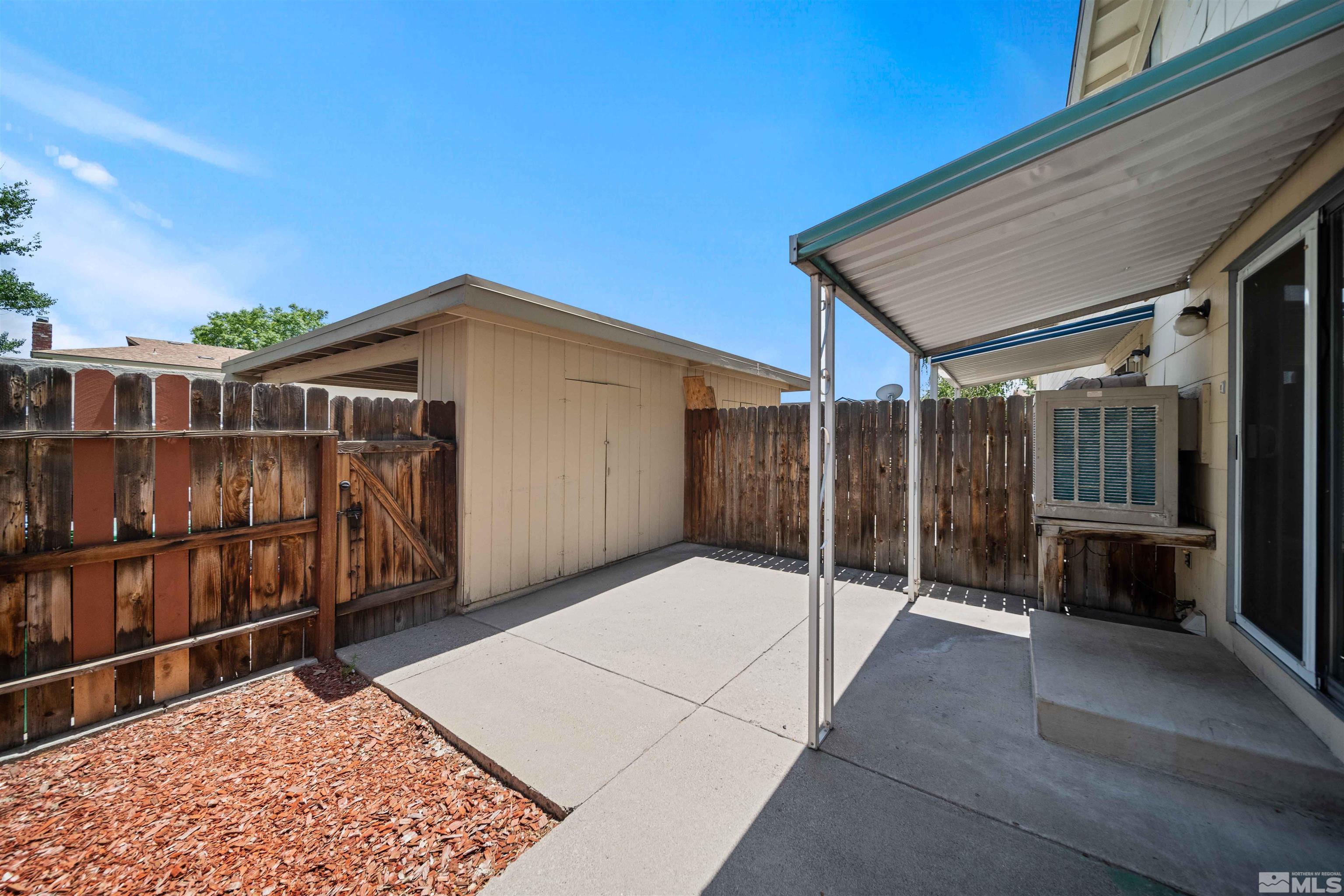 426 Smithridge Drive Reno, NV 89502 - Photo 18 of 20 a backyard of a house with a basket ball court