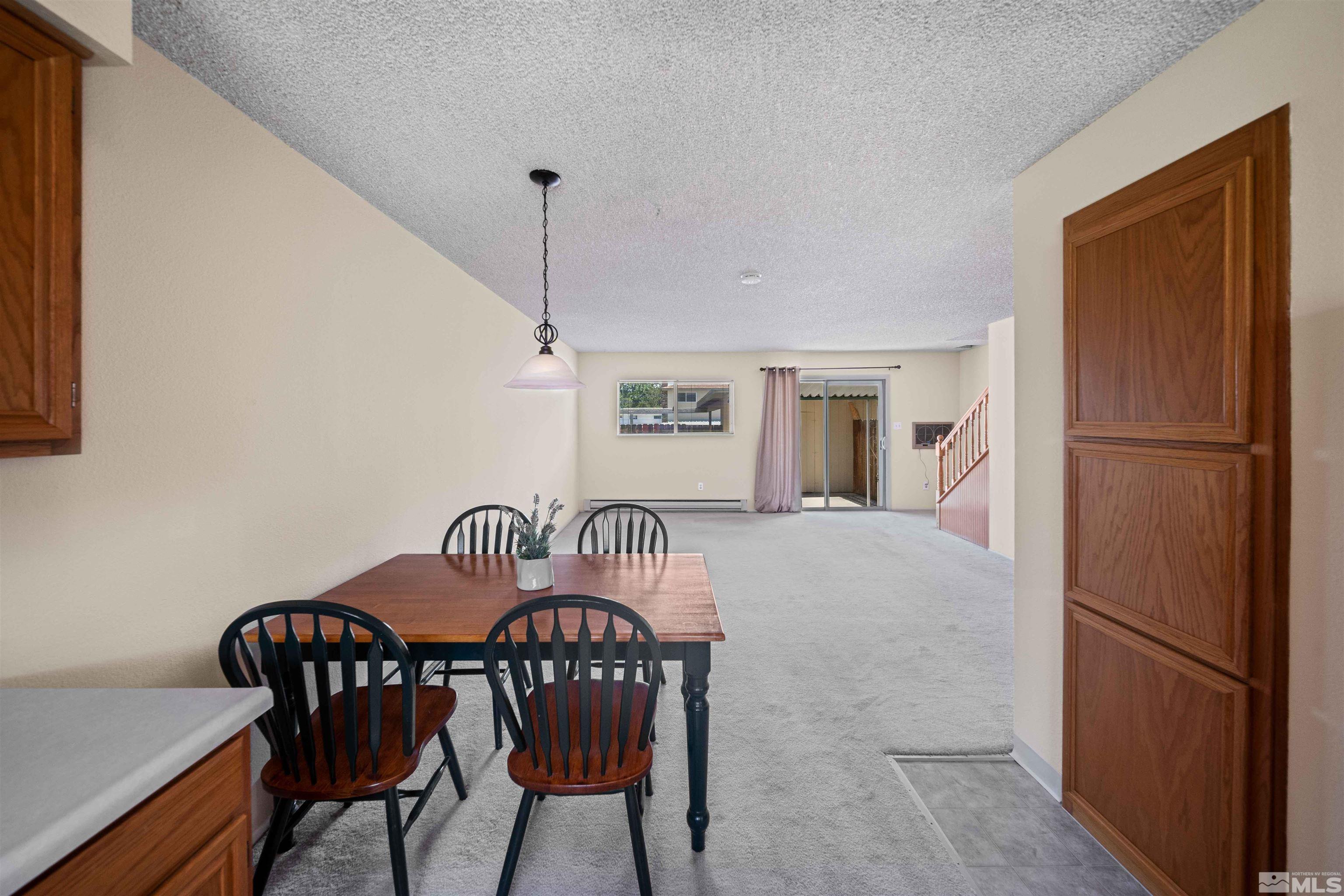426 Smithridge Drive Reno, NV 89502 - Photo 5 of 20 a view of a dining room with furniture